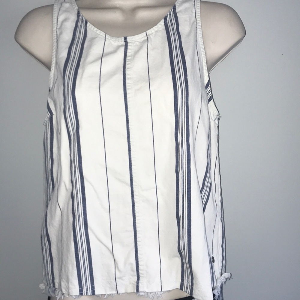 The perfect everyday summer tank!  Fringed bottom!